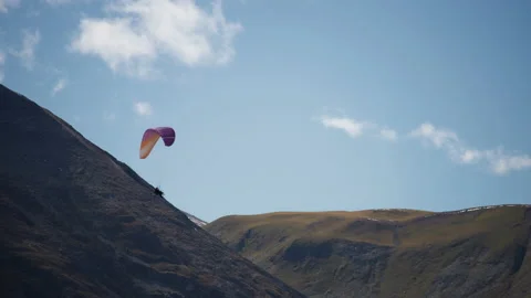 Paragliding next to the mountain slope Stock Footage 172533528