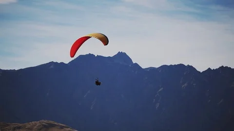 Paragliding over mountains Stock Footage 80355073