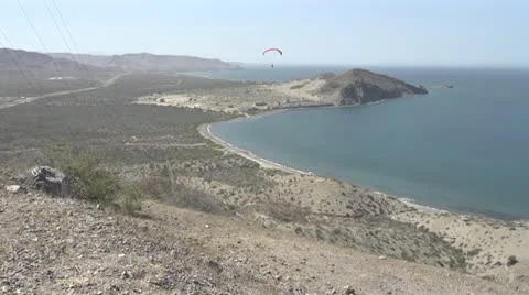 Paragliding over the ocean Stock Footage 22102849