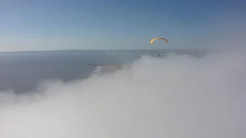 Paragliding over orographic cloud formations 스톡 동영상 169189300