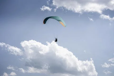 Paragliding with a pair of instructors Stock Photos