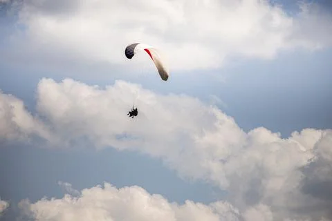 Paragliding with a pair of instructors Stock Photos