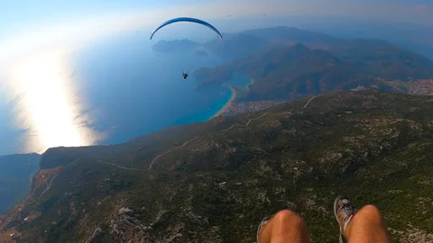 Paragliding point of view flying over Oludeniz view from gopro Video stock 241797486