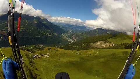 Paragliding POV view from action camera, paraglider flying with parachute. Stock Footage 128177967
