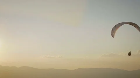 Paragliding into the sunset in Brazil Stock Footage 76422095