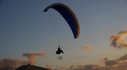 Paragliding at sunset Stock Footage 21923973