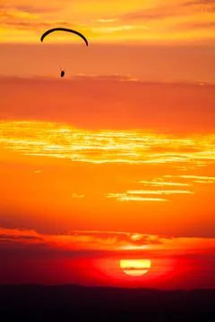 Paragliding in sunset Stock Photos