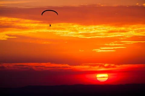 Paragliding in sunset Stock Photos
