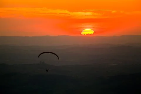 Paragliding in sunset Stock Photos