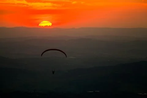 Paragliding in sunset Stock Photos