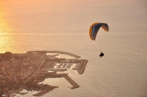 Paragliding to Sunset Stock Photos