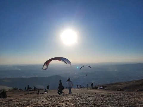 Paragliding at sunset Stock Photos