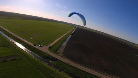 Paragliding in tandem, shooting with an FPV drone, paragliding Stock Footage 242523571