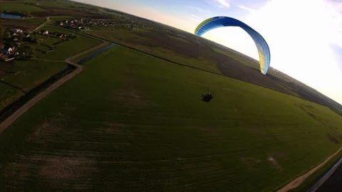 Paragliding in tandem, shooting with an FPV drone, paragliding Stock Footage 242523856