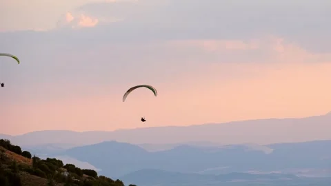 Paragliding Team Over Mountains Stock Footage 310752064