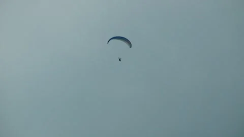 Paragliding through the mist of the mountains Stock Footage 278019553