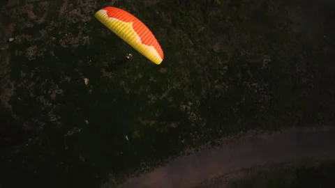 Paragliding training on the ground, top view, bright colors Stock Footage 252173925