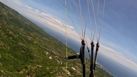 Paragliding tropical island ocean in the first person Stock Footage 242831753