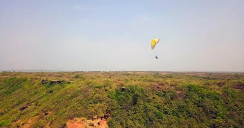 Paragliding in the tropics Stock Footage 98735778