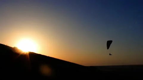 Paragliding turn at sunset Stock Footage 52133705