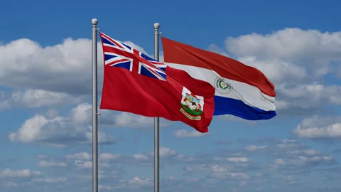 Paraguay and The Bermudas two flags Stock Footage 288118610