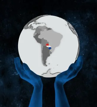 Paraguay on globe in hands Illustrazione stock