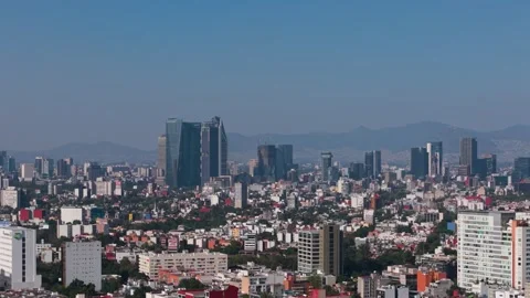 Parallax drone capture showcasing Mexico City under sunny skies 스톡 동영상 321503602