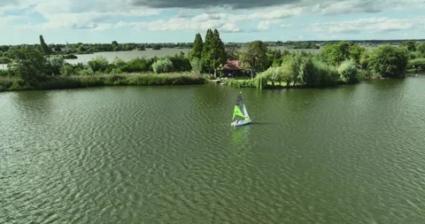 A parallax drone.shot of a sailboat Stock Footage 314390894