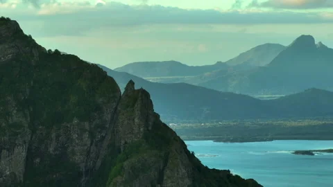 Parallax effect. Aerial view of the high peak of the mountain. The background Stock Footage 198673985