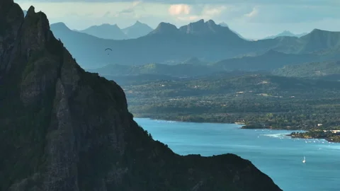Parallax effect. Aerial view of the high peak of the mountain. The background Stock Footage 200849032
