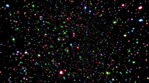 Parallax effect of glowing colored particles rotating seamlessly against a black Stock Footage 319436163