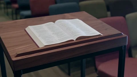Parallax Shot Featuring an Open Bible on a Pulpit at a Church Stock-Footage 155605630