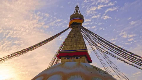 Parallax tracking of Boudhanath stupa during a golden hour sunset in Kathmandu Stock Footage 239091830