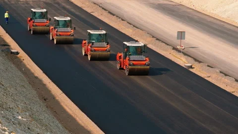 "Parallel Asphalt Compaction Machines" Stock-Footage 306022892