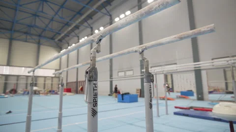 Parallel bars for developing upper body and core in gym Stock Footage 316749271