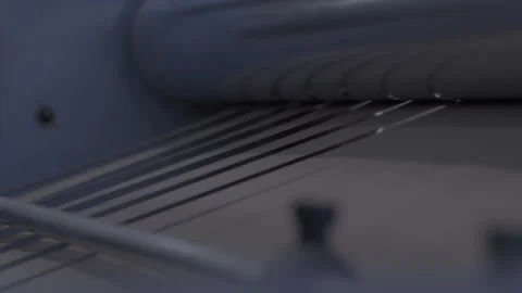 Parallel blades perform cutting of cardboard in special workshop Stock-Footage 294201329