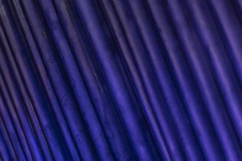 Parallel blue pipes creating textured industrial background Fotos de archivo