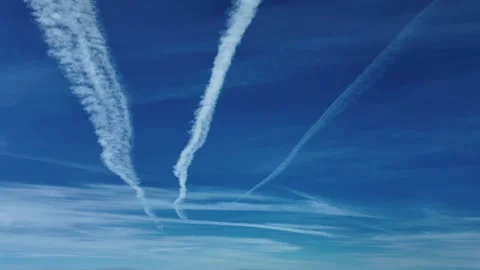 Parallel Contrails in a Deep Blue Sky, Seen From a Jet Cockpit Flying Bellow. Stock-Footage 318697656
