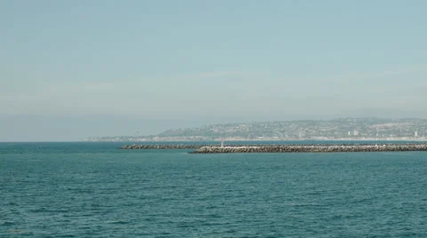 Parallel distant shot of jetty's from ocean  Stock Footage 46267435