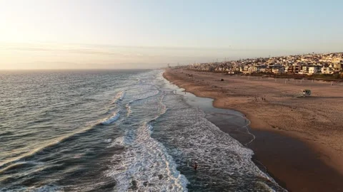 Parallel Drone Flight Along Manhattan Beach Surf and Coastline Stock Footage 344023489
