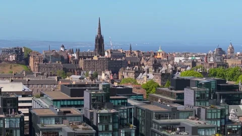 Parallel Drone Flight Over Edinburgh City with The Hub and Historic Buildings Stock Footage 315865779