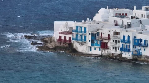 Parallel Drone Flight over Little Venice Seafront on Cloudy, Windy Mykonos Day Video stock 316601905