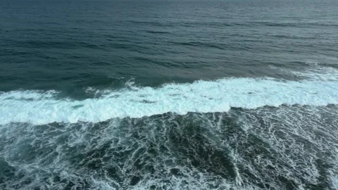 Parallel drone flight over the picturesque slow waves of the ocean. Stock-Footage 287244169