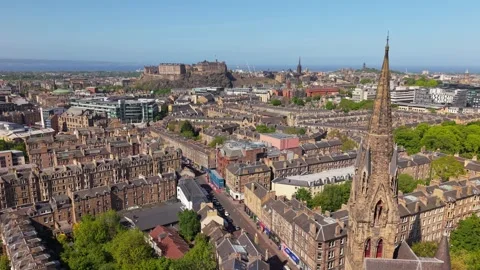 Parallel Drone Movement Capturing Edinburgh Castle and Barclay Viewforth Church Stock Footage 314691447