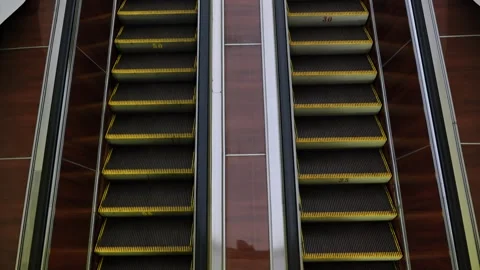 Parallel escalators moving people in a modern Moscow urban transport system Stock-Footage 327193391