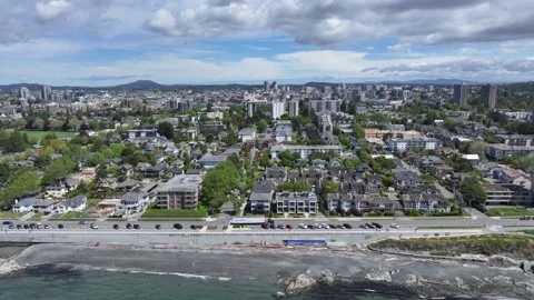 Parallel flight along Dallas Rd in James Bay district, Victoria, BC Stock Footage 276334143