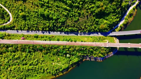 Parallel infrastructure over river, Bulgaria Stock Footage 337199489