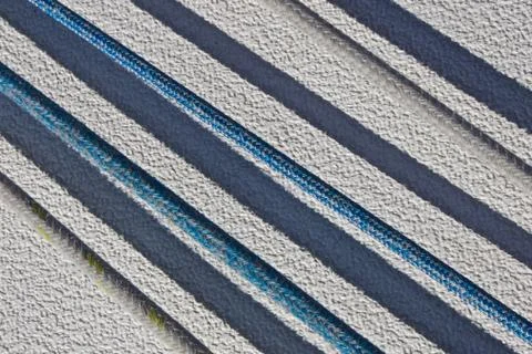 Parallel lines on a sailboat going to sails Фото