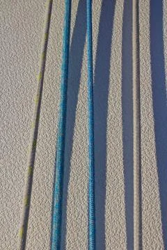 Parallel lines on a sailboat going to sails Stock Photos