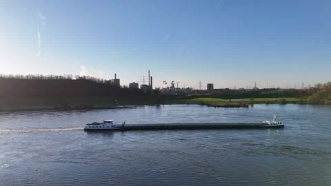 Parallel orbit around cargo ship before coking plant Video stock 331204987